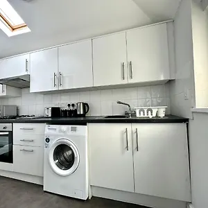  Apartment Coastal Comfort Duplex: Spacious 4-bedroom Near United Kingdom